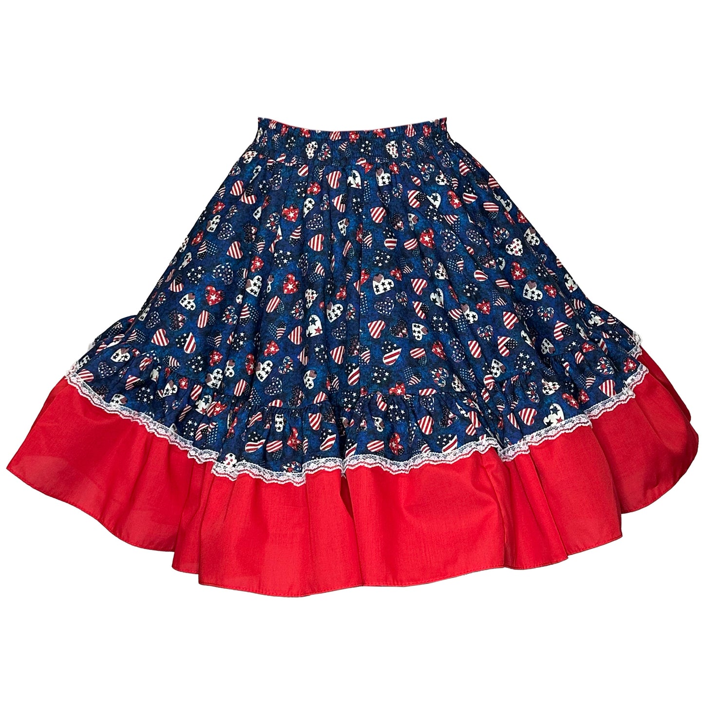 The Americana Square Dance Skirt by Square Up Fashions features blue and red knee-length ruffles, lace trim, and festive patriotic motifs—ideal for a standout 4th of July or Americana-inspired look.