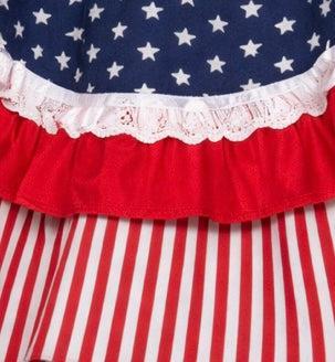 Close-up of the Square Up Fashions Patriotic Spirit 250th Anniversary Skirt, featuring a blue field with white stars, red and white lace ruffle, and bold stripes—ideal for a festive square dance or anniversary celebration.