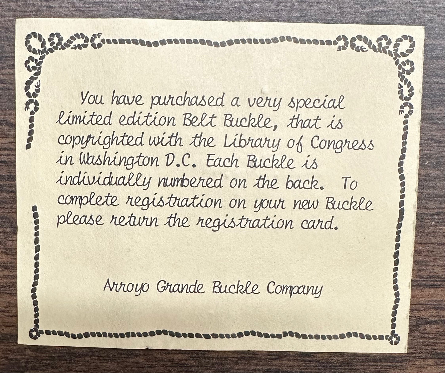A printed note from Square Up Fashions details registration and numbering for this limited-edition, commemorative 1989 Square Dance Buckle w/caller, made in the USA and copyrighted by the Library of Congress.