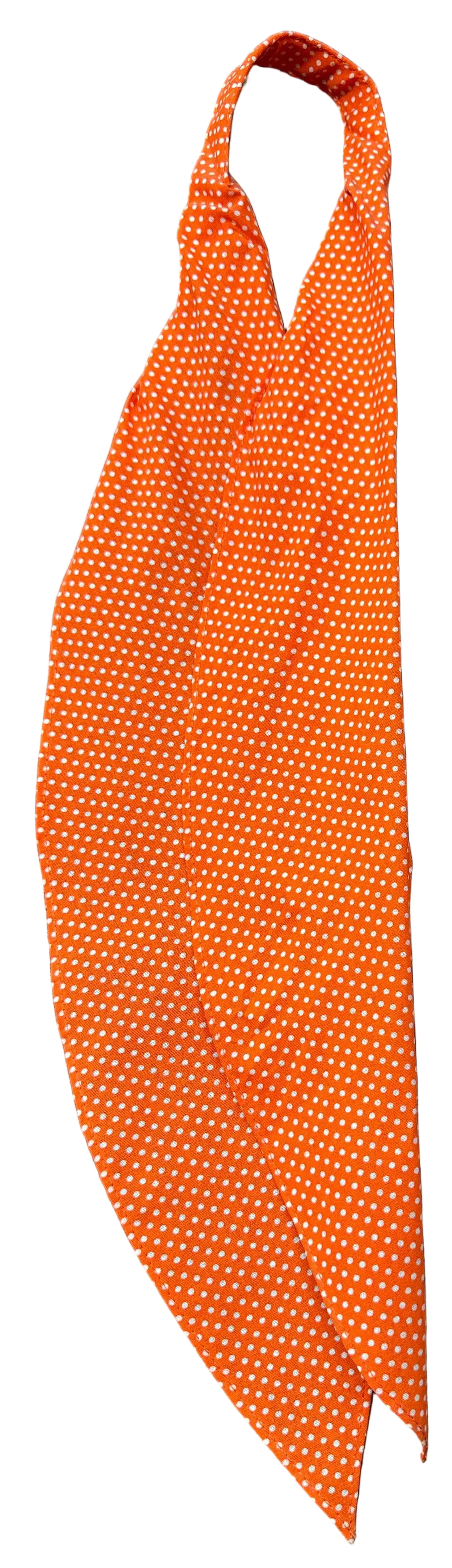 The CLEARANCE Polka Dot Scarf Ties by Square Up Fashions, featuring an orange fabric with a white dotted pattern inspired by Swiss polka dot ties, is displayed flat on a dark surface.