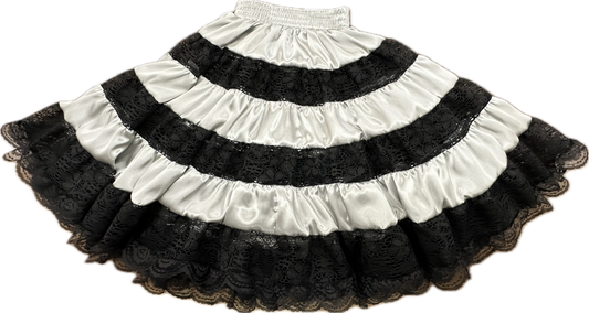 A black and white Charmeuse Square Dance Skirt made with shiny fabric by Square Up Fashions.