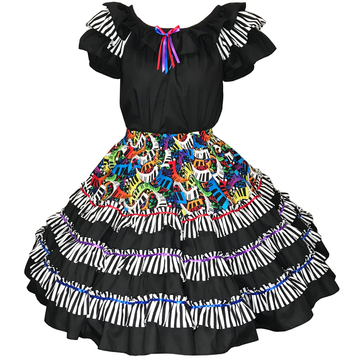 The Musical Square Dance Outfit by Square Up Fashions features a black ruffled top, colorful patterned skirt with piano key accents, short sleeves, and a pink and purple neckline ribbon—a standout choice for your next square dance! Only a few left.
