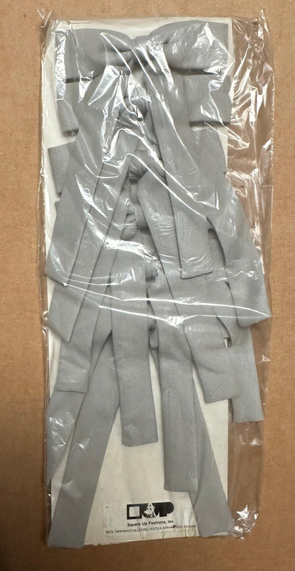 A package of Colonel Ties by Square Up Fashions, featuring gray latex balloon strips that evoke a western style, rests on a plain background.