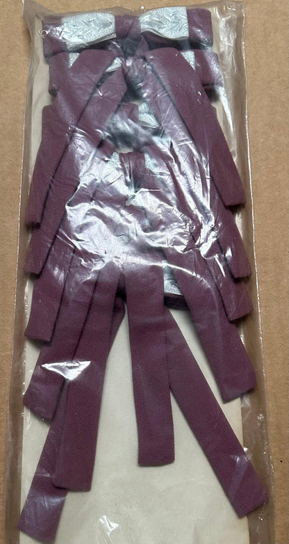 A sealed plastic package from Square Up Fashions containing several maroon Colonel Ties, each exuding a vintage western style, neatly stacked together.