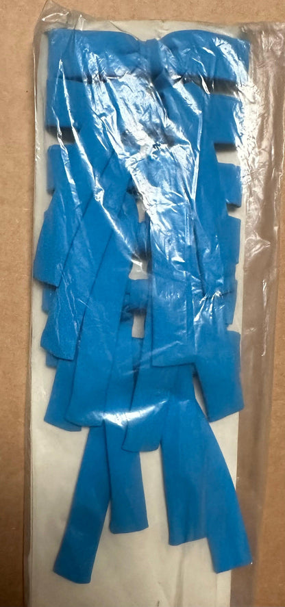 A sealed package of Colonel Ties by Square Up Fashions contains multiple blue, rectangular adhesive strips neatly arranged in a row, evoking a western look.