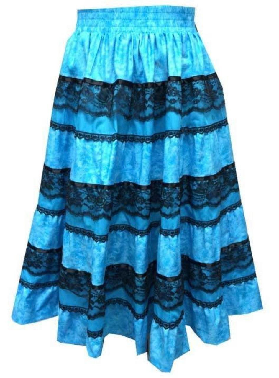 The Tone on Tone Prairie Skirt by Square Up Fashions features horizontal black lace stripes on blue fabric and a gathered, elastic waistband, making it a charming addition to any woman's wardrobe. Displayed against a white background.