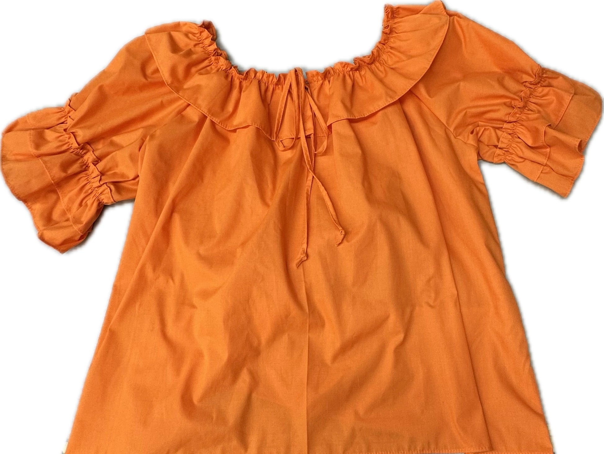 The Square Up Fashions Faux Drawstring Blouse features an orange off-shoulder design with double ruffle sleeves, a ruffled neckline, and a faux drawstring tie at the front for comfort.