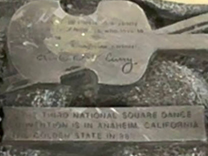 Square Up Fashions' Square Dance Buckle w/ instruments features a guitar-shaped design and engraved text commemorating the 1954 Third National Square Dance Convention in Anaheim, California—the "Golden State.