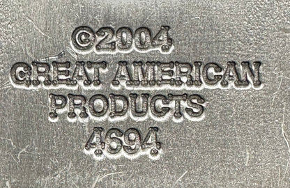 Embossed metal text on this Music Note Belt Buckle by Square Up Fashions reads: ©2004 GREAT AMERICAN PRODUCTS 4694, making it a unique collectible musical accessory.