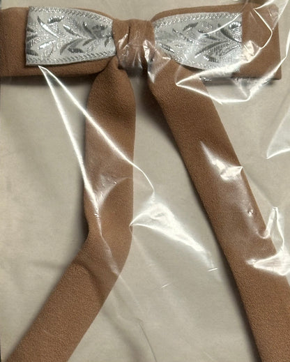 Colonel Ties, by Square Up Fashions, features a tan bow with an elegantly embroidered silver center that captures a sophisticated western style, meticulously packaged in clear plastic wrap.