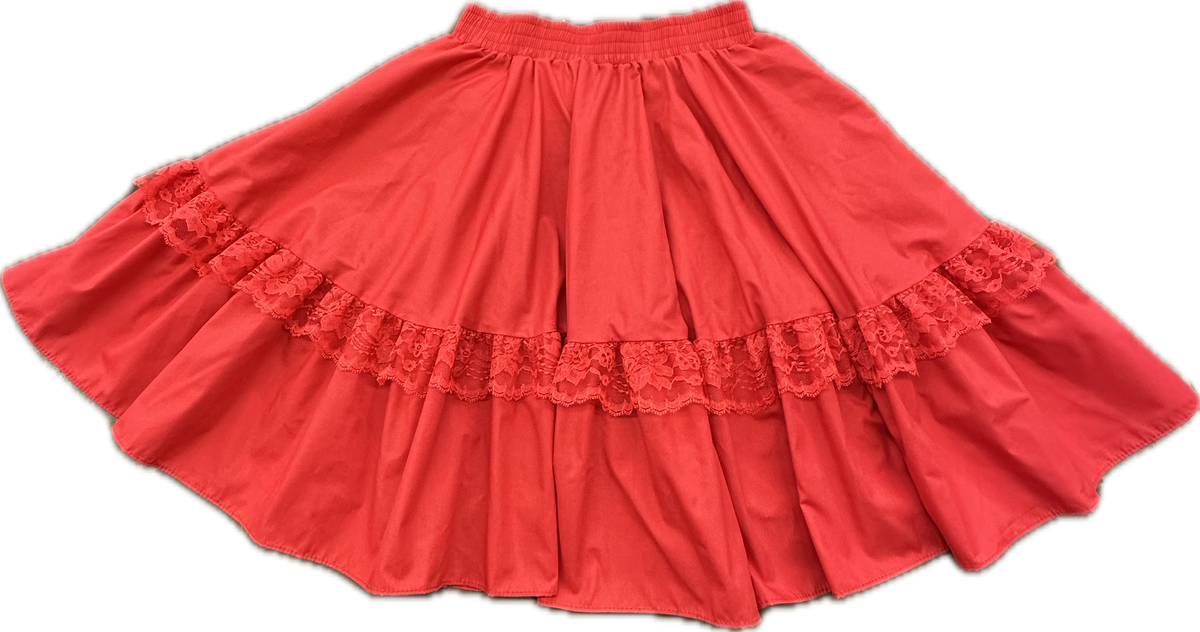A red Circle Skirt w/ lace by Square Up Fashions features knee-length ruffles and a lace trim near the hem, displayed flat on a white background.