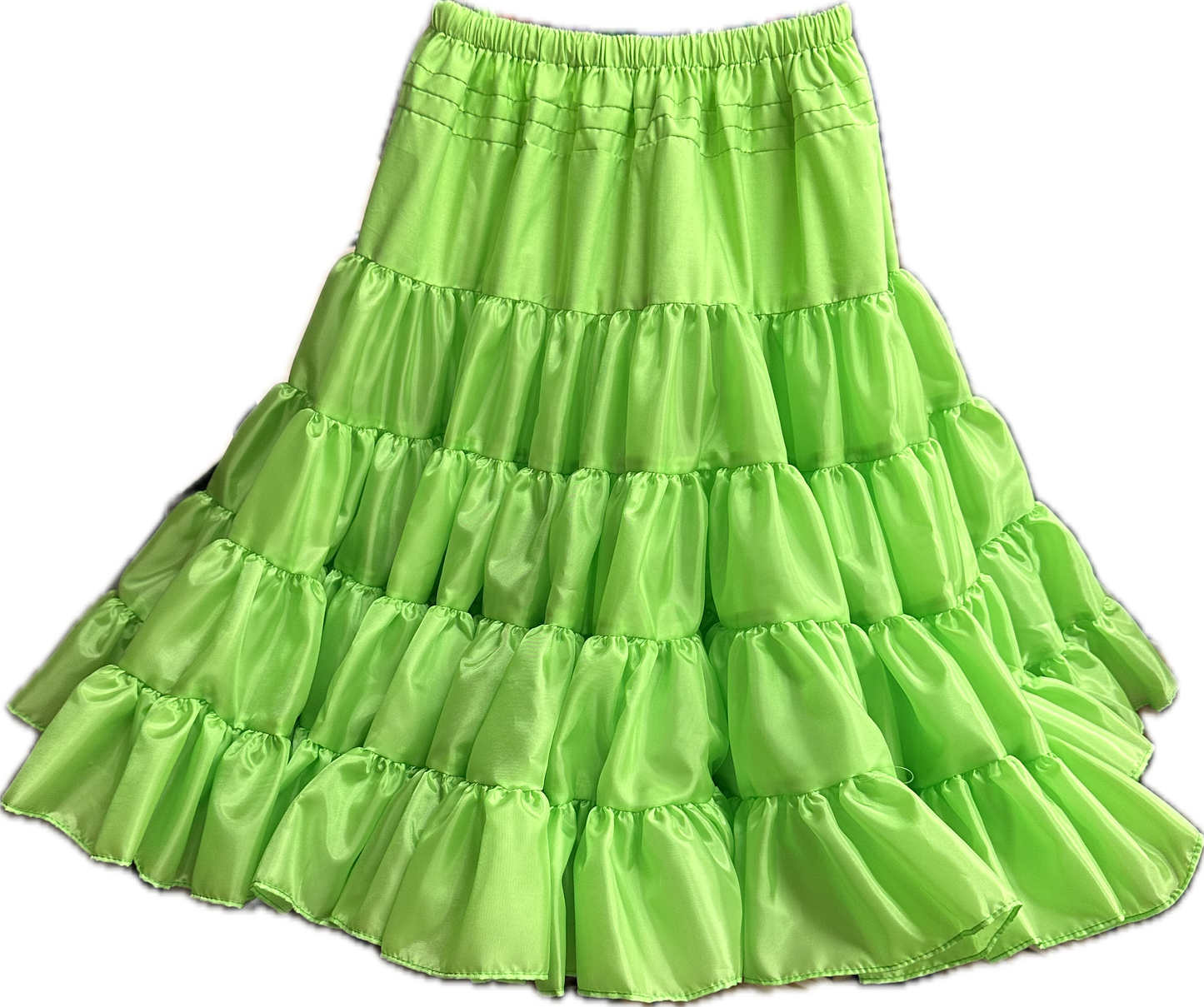 The Soft Poly-Liner Petticoat by Square Up Fashions is a bright green tiered ruffle skirt with an elastic waistband, perfect for square dancing, shown on a plain white background.