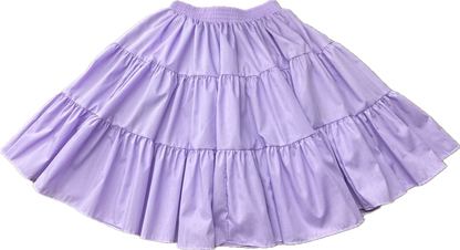 The Square Up Fashions Basic 3 Tier Square Dance Skirt is knee-length, features an elastic waistband, and comes in light purple fabric. Shown flat on a white background. Available in several colors.