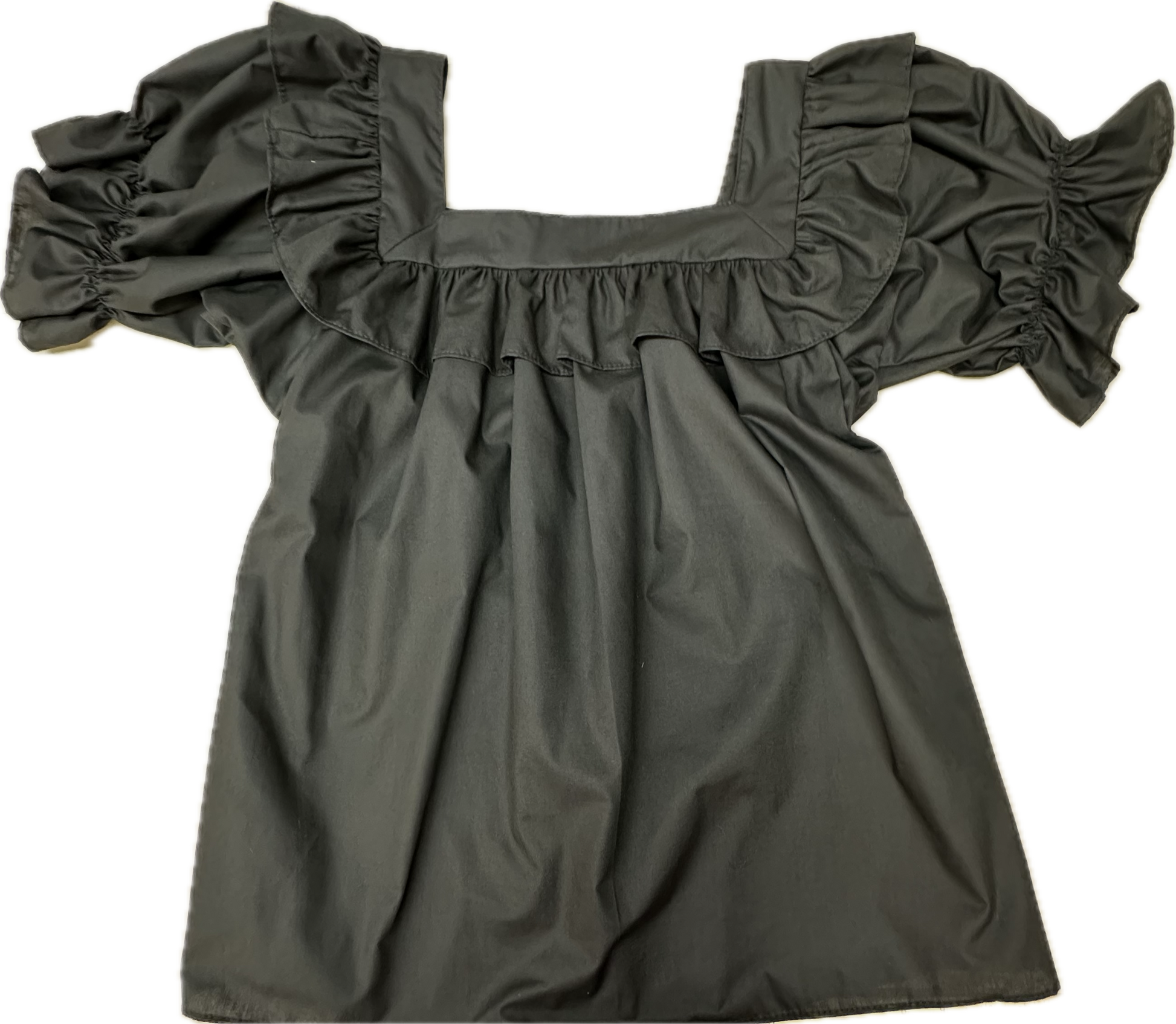 The Square Up Fashions Square Neck Blouse features short puffed sleeves, ruffled trim, and a design that stays tucked in for a polished all-day look.