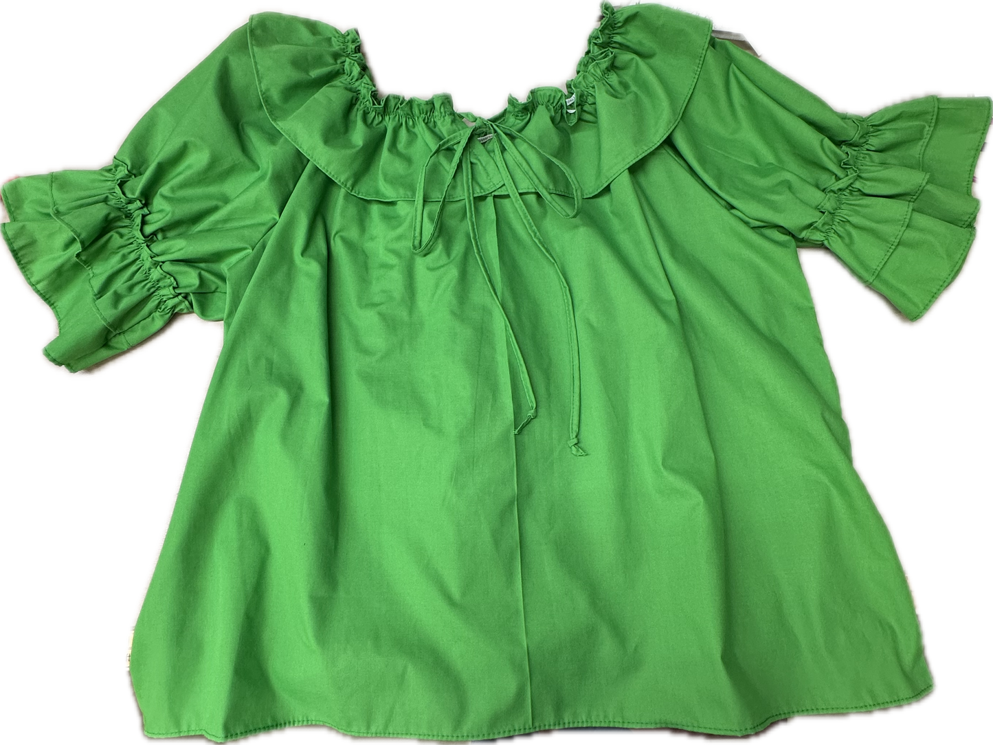 The Square Up Fashions Faux Drawstring Blouse features green short sleeves, a ruffled neckline, tie-front detail, and double ruffle sleeve cuffs. Shown laid flat on a white background for a comfortable fit.