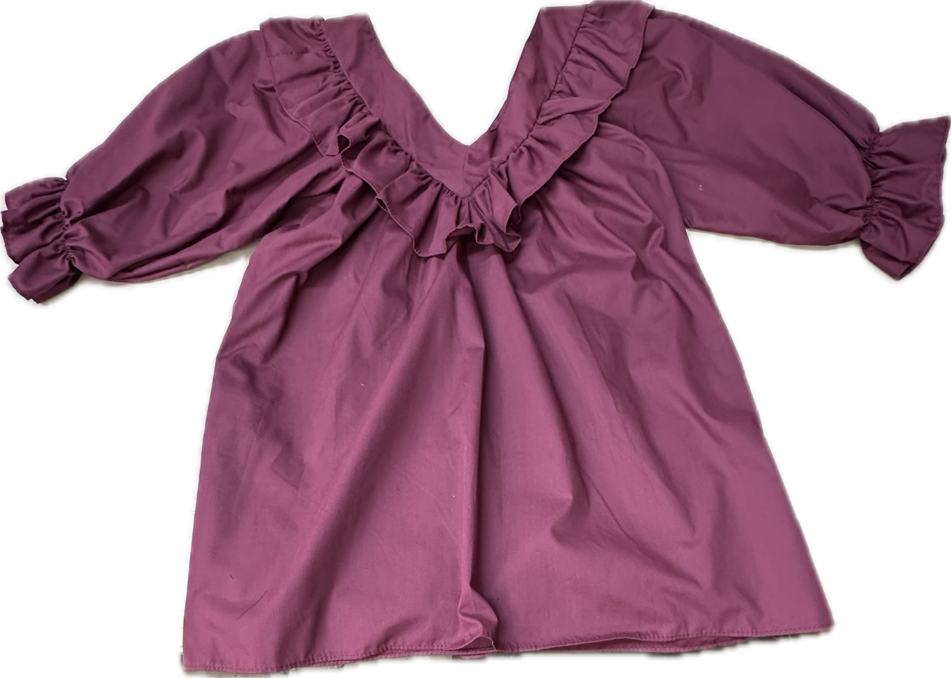 The Square Up Fashions V Neck 3/4 Sleeve Blouse in deep purple features ruffled trim along the neckline and elastic cuffs, shown on a white background.