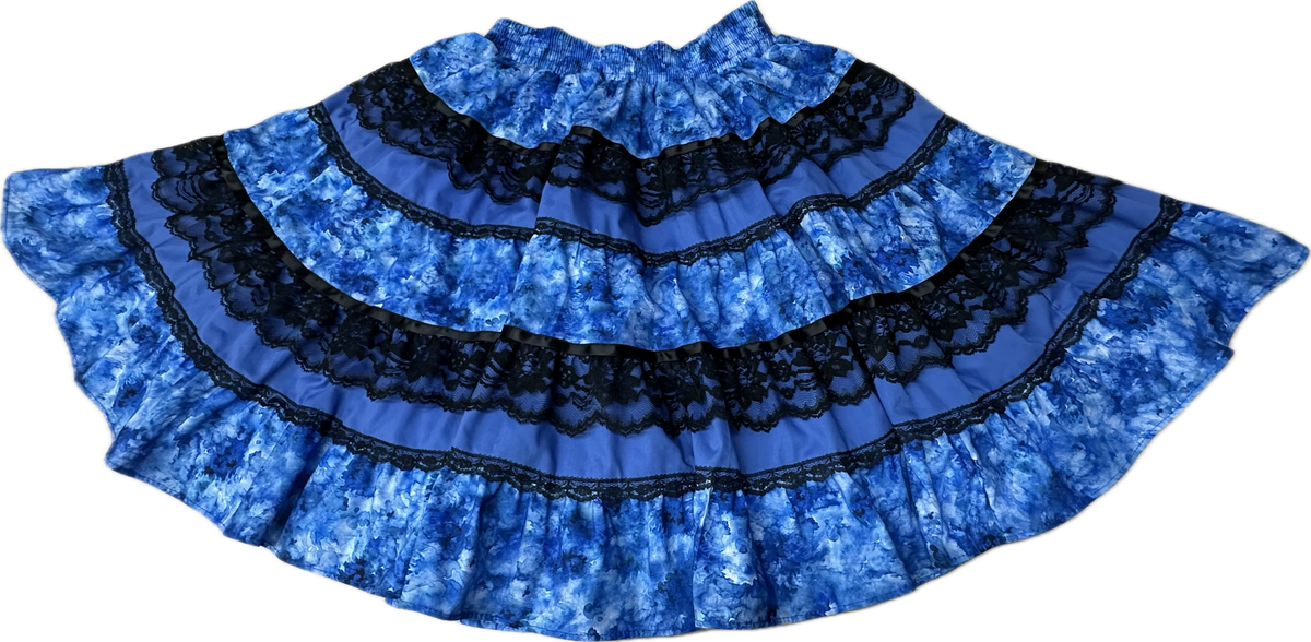 The Tone on Tone Square Dance Skirt by Square Up Fashions features five flared, tiered blue layers with black lace bands—an eye-catching addition to any woman's wardrobe.