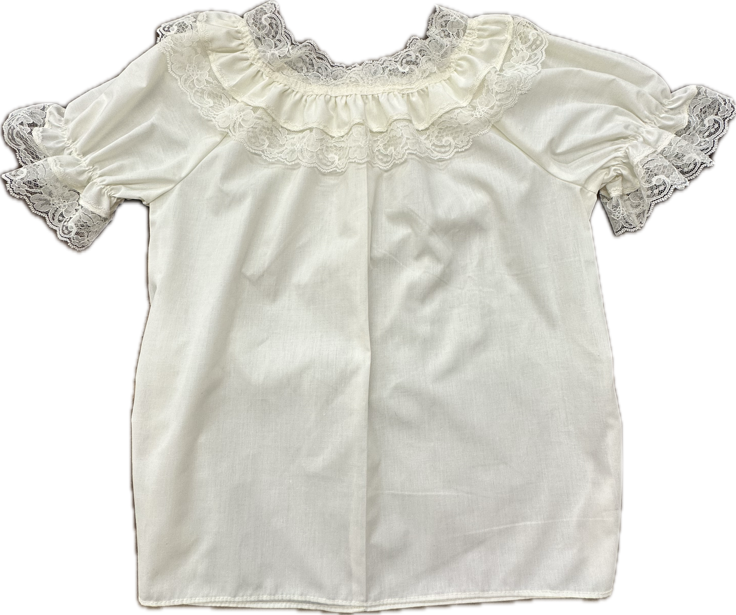 The Basic Laced Blouse by Square Up Fashions is a frilly lace garment with white short sleeves, exquisite lace detailing around the neckline, and elastic sleeves for added comfort.