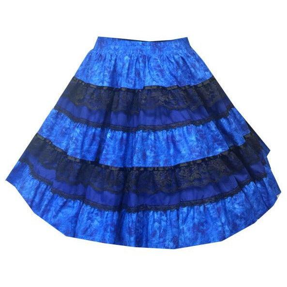 The Tone on Tone Square Dance Skirt by Square Up Fashions features a blue A-line design with three black lace bands and a gathered waistband, making it a stylish addition to any woman’s wardrobe.