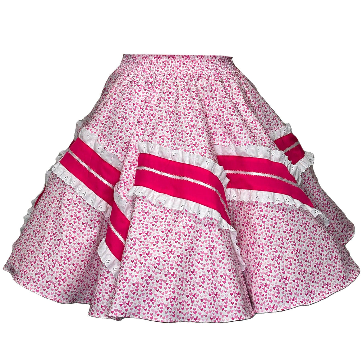 A white, heart print skirt with pink floral patterns, adorned with wide pink stripes and white ruffles from Square Up Fashions, called the Valentine&#39;s XL Square Dance Skirt.